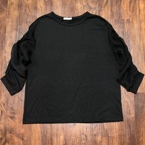 Pebble and Stone Size M, black cotton top with 3/4 length sheer, flutter sleeves